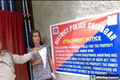 In yet another decisive action against the menace of drugs in society and to dismantle the infrastructure supporting illegal narcotics network, Srinagar Police has attached a residential property—comprising a two-storeyed house along with land—worth approximately Rs 50 lakhs belonging to a notorious drug peddler namely Bilal Ahmad Wani S/o Gh. Ahmad Wani R/o Sirgufwara, Anantnag, under the provisions of Narcotic Drugs and Psychotropic Substances (NDPS) Act.