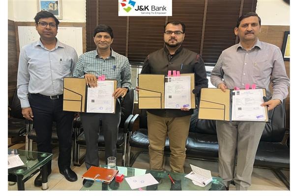 Reinforcing its significant role in financial oversight, J&K Bank has executed the Direct Debit Facility (DDF) Agreement with Jammu Power Distribution Corporation Limited (JPDCL). The agreement, developed in collaboration with REC Power Development and Consultancy Ltd (RECPDCL), underscores the Bank’s commitment to ensuring seamless financial operations and transaction security in high-value infrastructure projects.